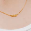 Naamketting geelverguld kleine drukletters